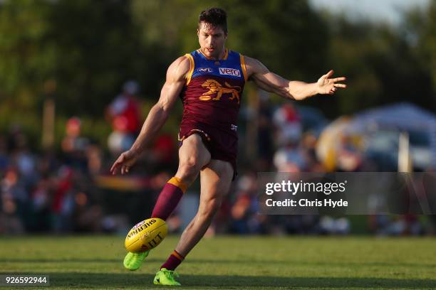 Stefan Martin of the Lions kicks during the AFL JLT Community Series match between the Brisbane Lions and the Sydney Swans at Moreton Bay Central...