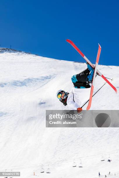 freestyle skier doing an extreme jump - freestyle skiing stock pictures, royalty-free photos & images
