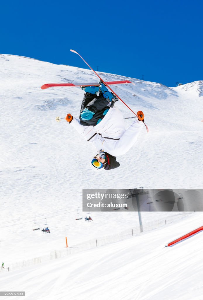Freestyle skier doing an extreme jump