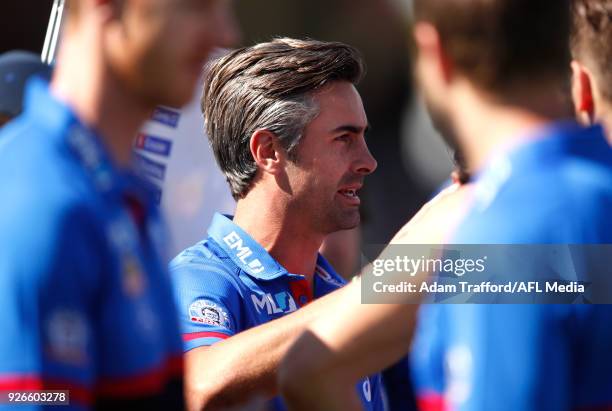 Daniel Giansiracusa, Acting Senior Coach of the Bulldogs addresses his players during the AFL 2018 JLT Community Series match between the Western...