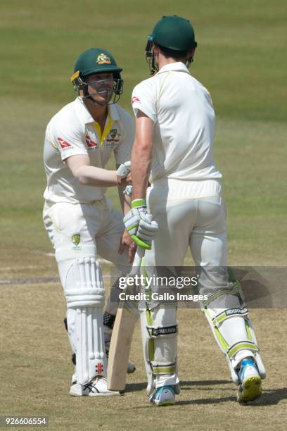 David Warner and of Australia 50 run partnership during day 3 of the 1st Sunfoil Test match between South Africa and Australia at Sahara Stadium...