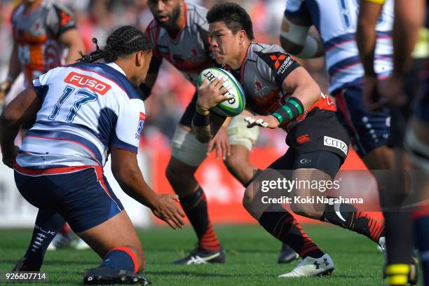 Harumichi Tatekawa of Sunwolves is tackled during the Super Rugby round 3 match between Sunwolves and Rebels at the Prince Chichibu Memorial Ground...