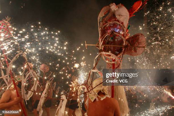 Villagers perform fire dragon dance to celebrate Lantern Festival at Santai County on March 2, 2018 in Mianyang, Sichuan Province of China. Chinese...