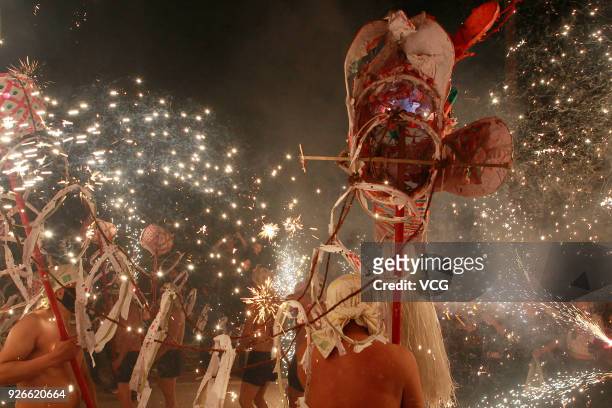 Villagers perform fire dragon dance to celebrate Lantern Festival at Santai County on March 2, 2018 in Mianyang, Sichuan Province of China. Chinese...
