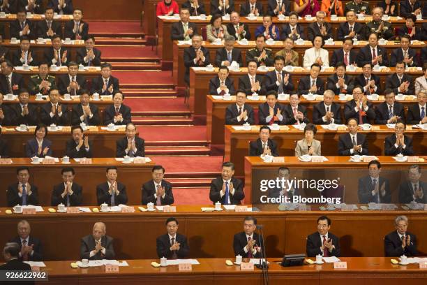 Zhang Dejiang, chairman of the Standing Committee of the National People's Congress, second row fourth left, Xi Jinping, China's president, second...