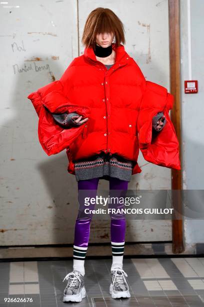 Model presents a creation by Junya Watanabe during the 2018/2019 fall/winter collection fashion show on March 3, 2018 in Paris. / AFP PHOTO /...