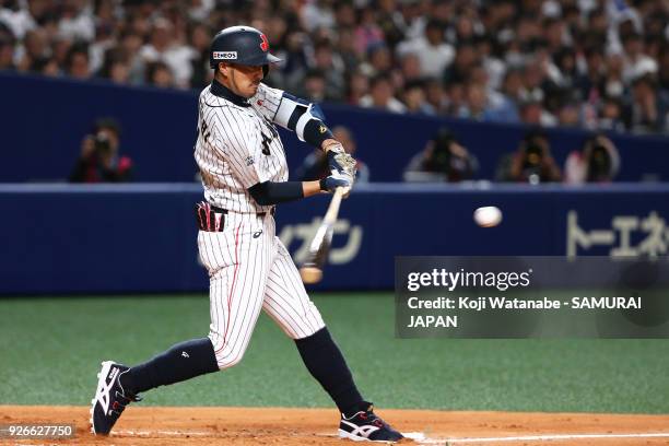 Ryosuke Kikuchi of Japan bats in the bottom half of the first inning during the game one of the baseball international match between Japan And...