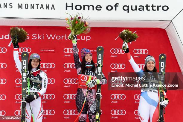 Anna Veith of Austria takes 2nd place, Tina Weirather of Liechtenstein takes 1st place, Wendy Holdener of Switzerland takes 3rd place during the Audi...