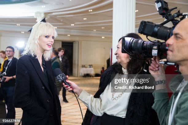 Model speak to a media backstage before the Redemption show as part of the Paris Fashion Week Womenswear Fall/Winter 2018/2019 on March 2, 2018 in...