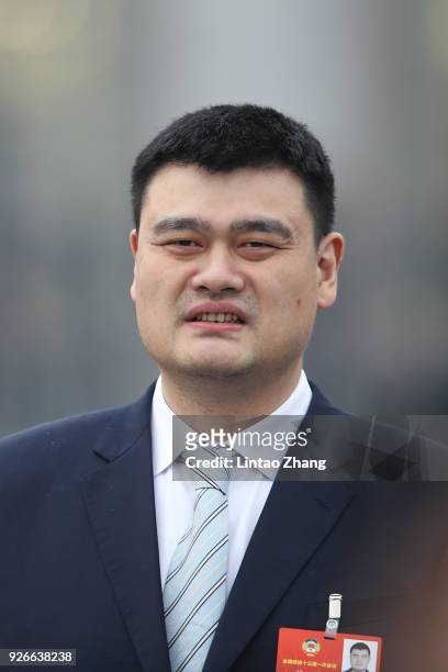 Former NBA star Yao Ming arrives at the Great Hall of the People to attend the opening ceremony of the Chinese People's Political Consultative...
