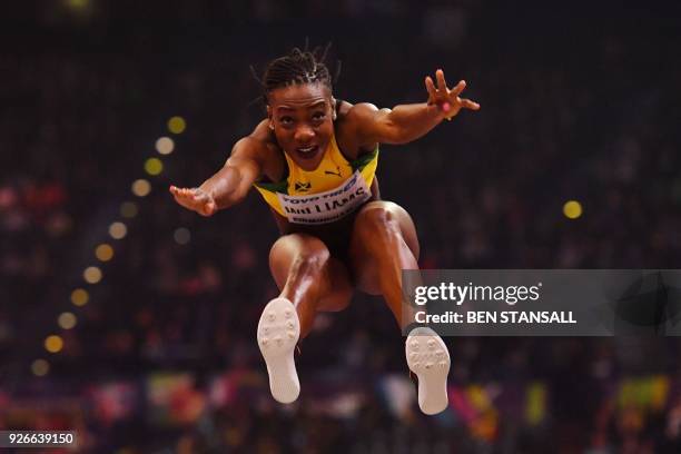 Jamaica's Kimberly Williams competes in the women's triple jump final at the 2018 IAAF World Indoor Athletics Championships at the Arena in...