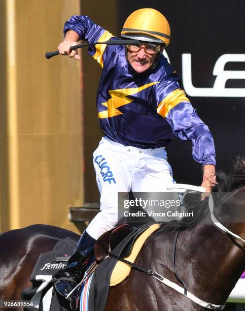 Damien Oliver riding Grunt reacts on the post to win Race 7, Australian Guineas during Melbourne Racing at Flemington Racecourse on March 3, 2018 in...