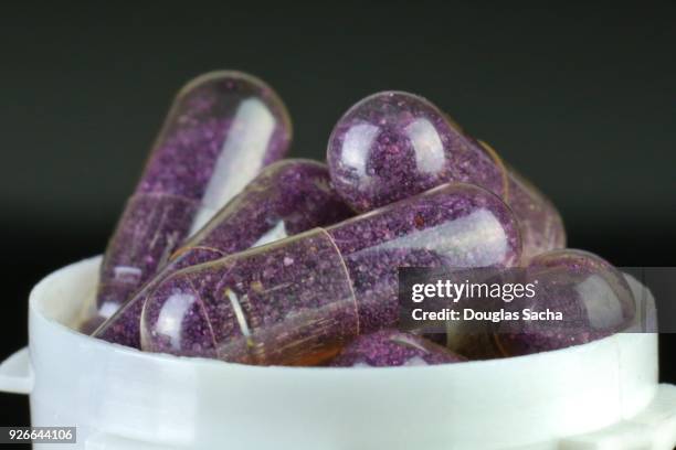 Purple Colored Prescription Capsules High-Res Stock Photo - Getty Images