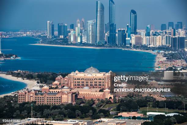 skyscrapers in abu dhabi - emirates palace stock pictures, royalty-free photos & images