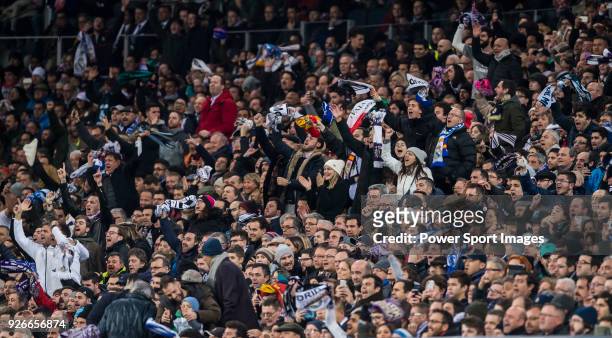 Soccer fans celebrate Cristiano Ronaldo of Real Madrid's second goal for the team during the UEFA Champions League 2017-18 Round of 16 match between...