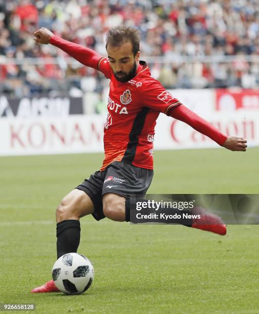 Gabriel Xavier of Nagoya Grampus shoots during the second half of a 1-0 win over Jubilo Iwata in the J-League first division in Toyota, Japan, on...