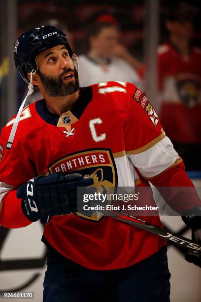 Derek MacKenzie of the Florida Panthers skates on the ice prior to the start of the game against the New Jersey Devils at the BB&T Center on March 1,...