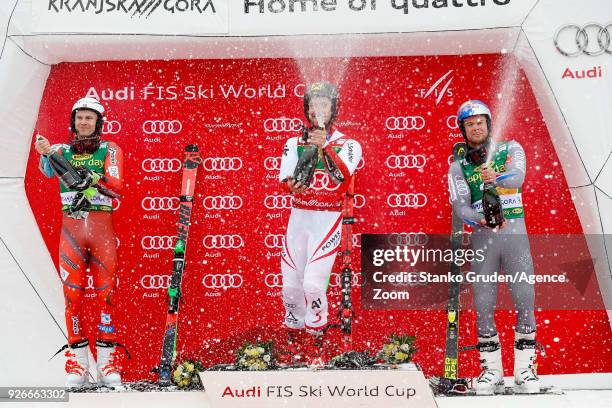 Henrik Kristoffersen of Norway takes 2nd place, Marcel Hirscher of Austria takes 1st place, Alexis Pinturault of France takes 3rd place during the...