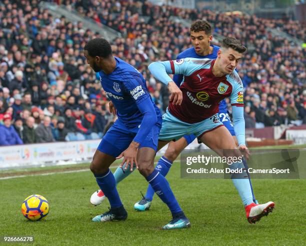 Burnley's Matthew Lowton battles with Everton's Cuco Martina and Dominic Calvert-Lewin during the Premier League match between Burnley and Everton at...