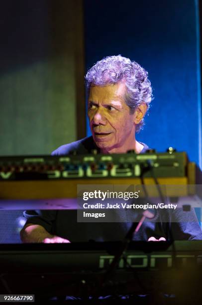 American Jazz musician Chick Corea plays keyboards as he leads the Corea/Gadd Band during the late set at the Blue Note nightclub, New York, New...