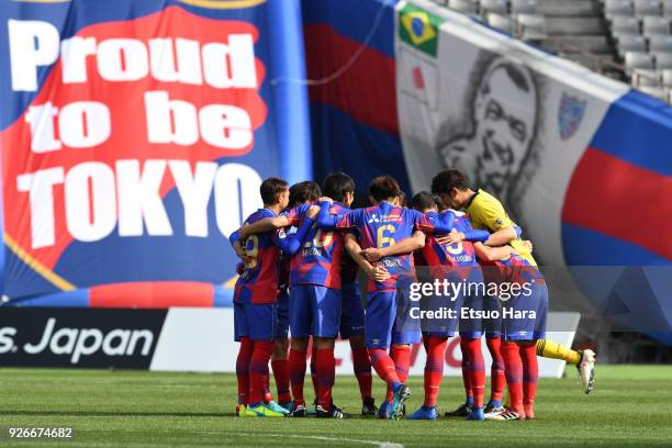 Players of FC Tokyo huddle during the J.League J1 match between FC Tokyo and Vegalta Sendai at Ajinomoto Stadium on March 3, 2018 in Chofu, Tokyo,...