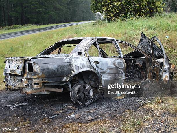 burnt out car - singed stock pictures, royalty-free photos & images