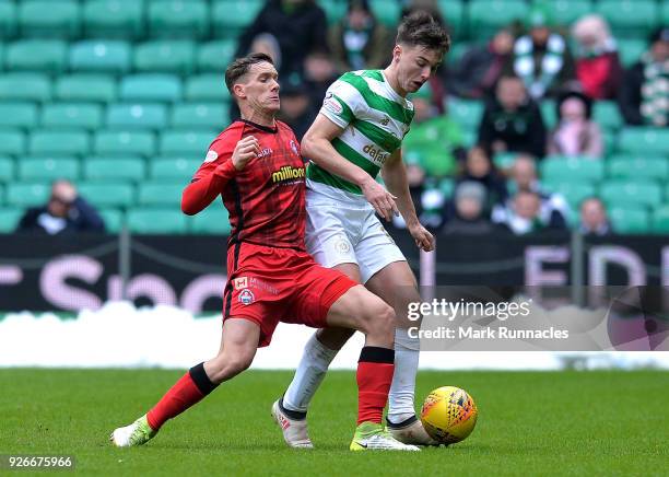 Kieran Tierney of Celtic is tackled by Michael Tidser of Greenock Morton during the Scottish Cup Quarter Final match between Celtic and Greenock...