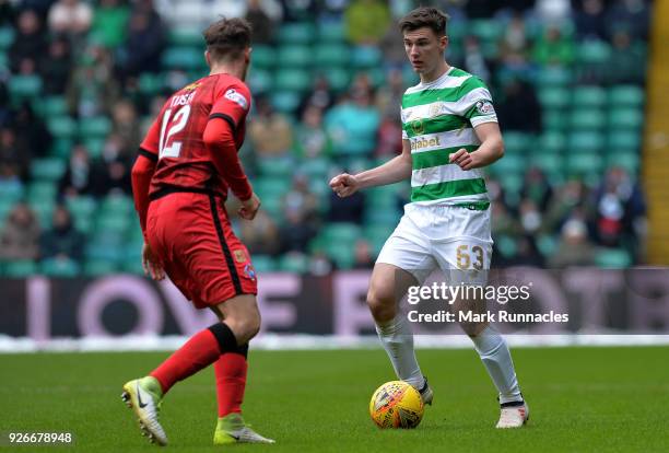 Kieran Tierney of Celtic is challenged by Michael Tidser of Greenock Morton during the Scottish Cup Quarter Final match between Celtic and Greenock...