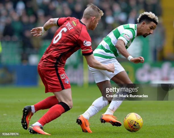 Scott Sinclair of Celtic is tracked by Michael Doyle of Greenock Morton during the Scottish Cup Quarter Final match between Celtic and Greenock...