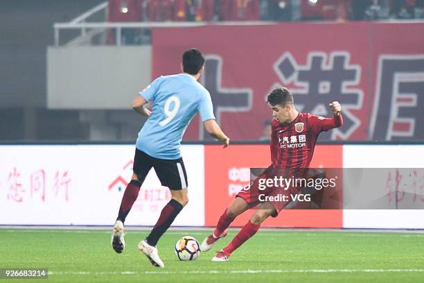 Oscar of Shanghai SIPG shoots the ball during the 2018 Chinese Football Association Super League first round match between Shanghai SIPG and Dalian...