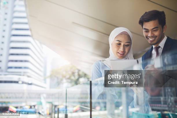 business meeting in kuala lumpur. - islam stock pictures, royalty-free photos & images