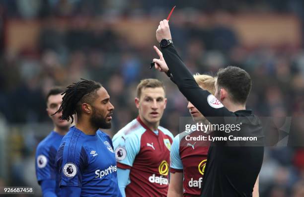 Ashley Williams of Everton is shown a red card by referee Chris Kavanagh during the Premier League match between Burnley and Everton at Turf Moor on...