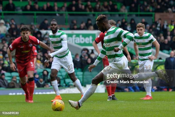 Moussa Dembele of Celtic scores his second goal of the game from the penalty spot during the Scottish Cup Quarter Final match between Celtic and...