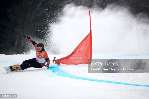 Kaspar Fluetsch of Switzerland in action during the Men's Snowboard Parallel Giant Slalom competition at Phoenix Snow Park on February 24, 2018 in...