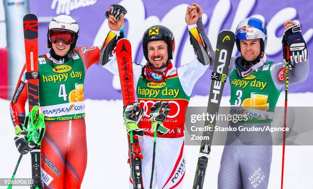 Henrik Kristoffersen of Norway takes 2nd place, Marcel Hirscher of Austria takes 1st place, Alexis Pinturault of France takes 3rd place during the...