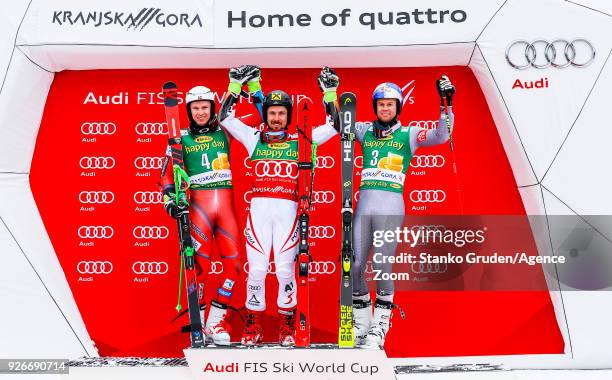 Henrik Kristoffersen of Norway takes 2nd place, Marcel Hirscher of Austria takes 1st place, Alexis Pinturault of France takes 3rd place during the...