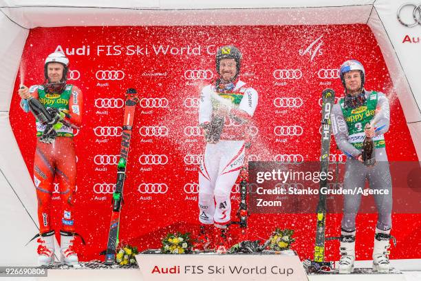 Henrik Kristoffersen of Norway takes 2nd place, Marcel Hirscher of Austria takes 1st place, Alexis Pinturault of France takes 3rd place during the...