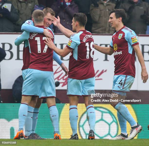 Burnley's Chris Wood celebrates scoring his side's second goal with teammates Johann Gudmundsson, Ashley Westwood and Jack Cork during the Premier...