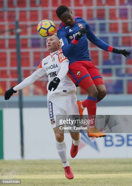 Vitinho of PFC CSKA Moscow vies for the ball with Alexander Dantsev of FC Ural Ekaterinburg during the Russian Premier League match between PFC CSKA...