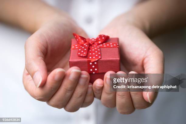 gift box,gift boxs - tiny hands stock pictures, royalty-free photos & images