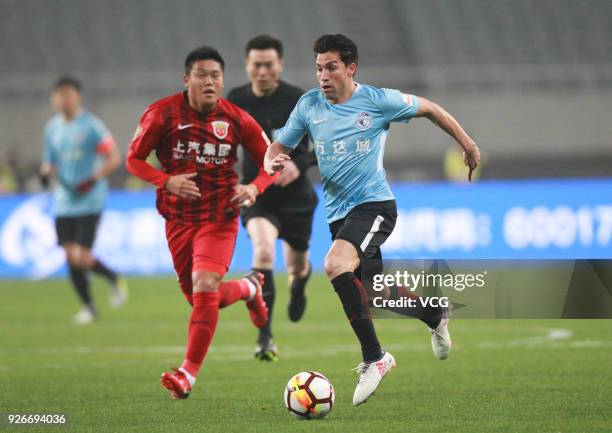Nicolas Gaitan of Dalian Yifang controls the ball during the 2018 Chinese Football Association Super League first round match between Shanghai SIPG...