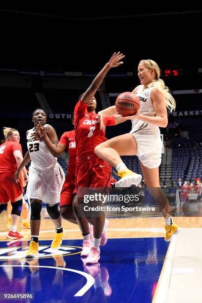 Missouri Tigers guard Lauren Aldridge drives the lane against Mississippi Lady Rebels guard Bree Glover during the fourth period between the Missouri...