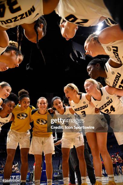 Missouri Tigers celebrate the win at mid court during the third period between the Missouri Tigers and the Ole Miss Rebels in a SEC Women's...