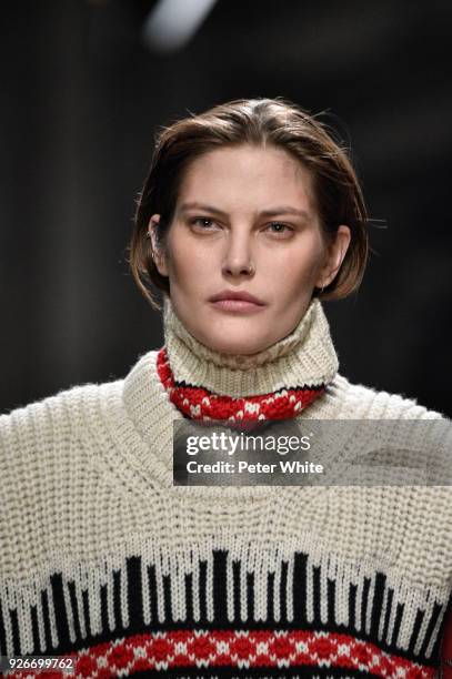 Catherine McNeil walks the runway during the Isabel Marant show as part of the Paris Fashion Week Womenswear Fall/Winter 2018/2019 on March 1, 2018...