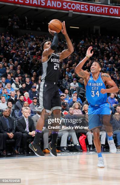 Buddy Hield of the Sacramento Kings shoots against Josh Huestis of the Oklahoma City Thunder on February 22, 2018 at Golden 1 Center in Sacramento,...