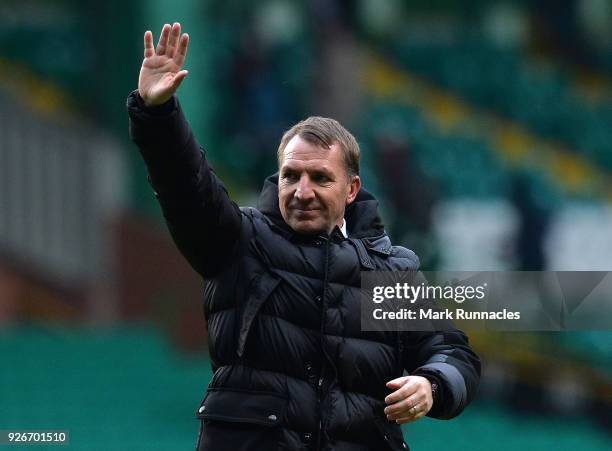 Celtic manager Brendan Rodgers waves to the crowd at the final whistle as Celtic win 3-0 during the Scottish Cup Quarter Final match between Celtic...