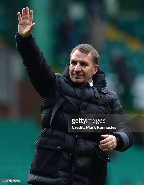 Celtic manager Brendan Rodgers waves to the crowd at the final whistle as Celtic win 3-0 during the Scottish Cup Quarter Final match between Celtic...