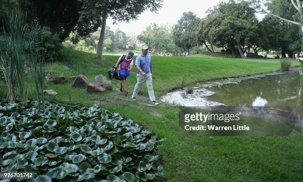 George Coetzee of South Africa walks to the 15th green during the third round of the Tshwane Open at Pretoria Country Club on March 3, 2018 in...