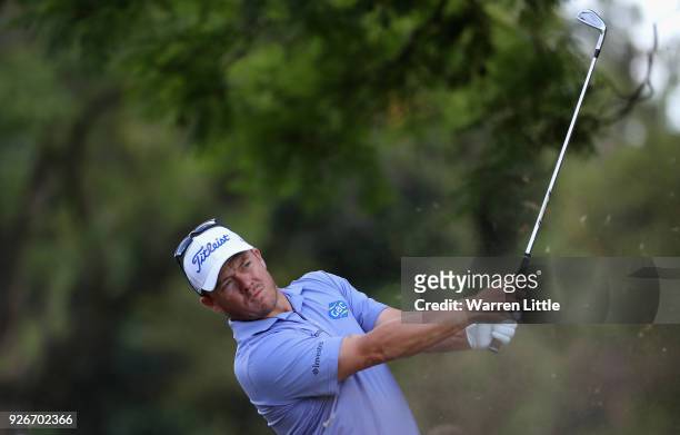 George Coetzee of South Africa tees off on the 14th hole during the third round of the Tshwane Open at Pretoria Country Club on March 3, 2018 in...