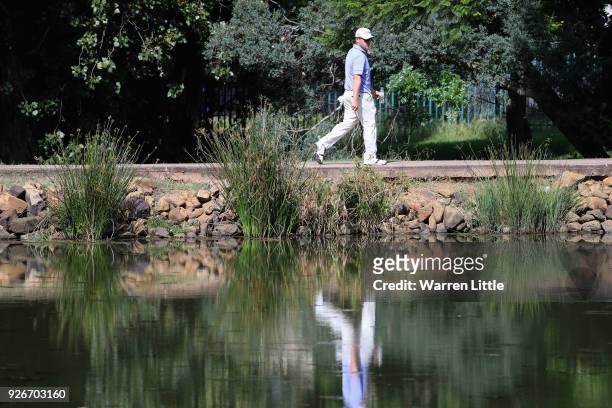 George Coetzee of South Africa walks to the 13th fairway during the third round of the Tshwane Open at Pretoria Country Club on March 3, 2018 in...
